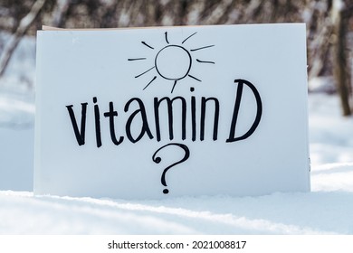 Vitamin D Help In Treating Coronavirus. Vitamin D And Question Mark On White Background.