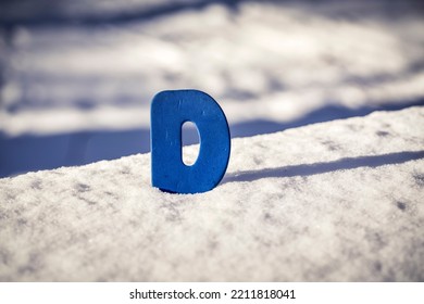 Vitamin D Help In Treating Coronavirus. Vitamin D On Snow Background.