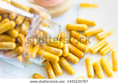 Vitamin D-3 capsules in bottle. Cod liver oil omega 3 gel capsules. Vitamins, dietary supplements, drugs, Pharmacy, medicine and health concept. capsule pharmacy bottle pill drug concept.