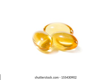 Vitamin E Capsules Isolated On A White Background