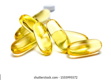 Vitamin E Omega 3 Fish Oil Yellow Pills Vitamins Sport Nutrition Healthy On The White Background Isolated Close Up