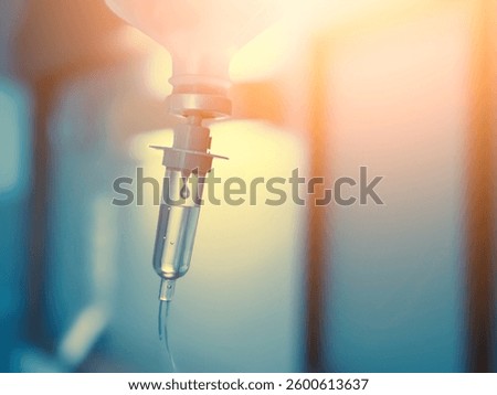 Vitamin IV drip infusion therapy in a medical setting. Close-up of intravenous therapy with liquid nutrients for health and wellness.”