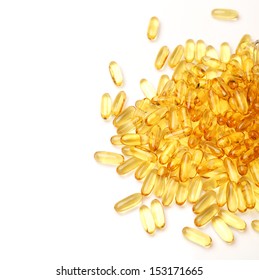 Vitamin Omega-3 fish oil capsules on white background - Shutterstock ID 153171665