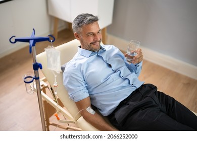 Vitamin Therapy IV Drip Infusion In Man Blood