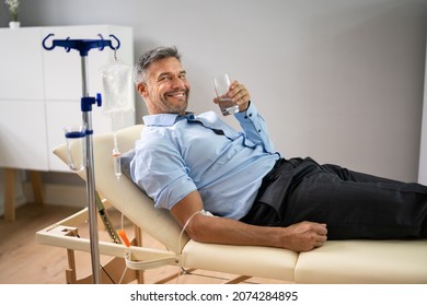 Vitamin Therapy IV Drip Infusion In Man Blood