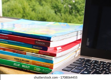 Vitebsk, Belarus - October 12, 2019. Distance Learning. Virtual Education During A Pandemic. Collection Of ESL Books For Learning English. A Pile Of ESL Textbooks.