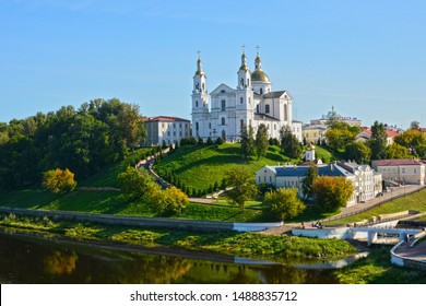 Vitebsk,Belarus - 25/08/2019: Holy Assumption Cathedral of the Assumption on the hill and the Holy Spirit convent and Western Dvina River. Vitebsk, Belarus