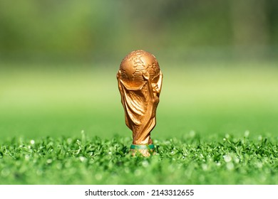 Vitoria, Espirito Santo, Brazil - April 06 2022: Copy of Soccer World Cup trophy on soccer field lawn
