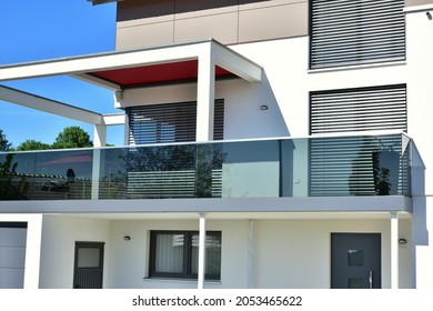 Vitrified High-grade Steel Balcony With Glass Panel Privacy Shield And Integrated Pergola At A Modern Residential Building