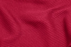 Viva Magenta Toned Colour Monochrome Texture Knitted Fabric. Dark Pink Knitted Jersey As Textile Background. Monochrome Color Background. Wool Knitting Texture. Trendy Color 2023.