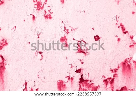 Viva Magenta wall with dirty scratches and metal stains. Metal rust monochrome background. Color of the 2023 year.