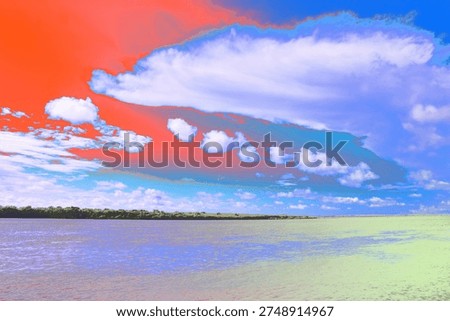 Vivid abstract gradient sky over horizon with dramatic colorful cloud textures