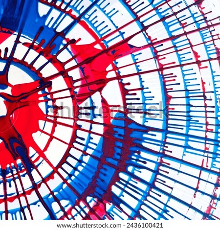 A vivid abstract image showcasing a mesmerizing interplay between red and blue paint splatters, creating a web-like structure that exudes energy and movement