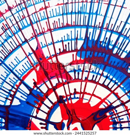 A vivid abstract image showcasing a mesmerizing interplay between red and blue paint splatters, creating a web-like structure that exudes energy and movement