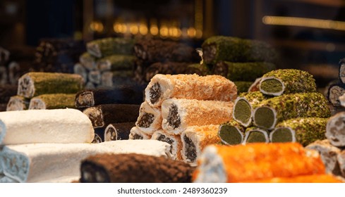 a vivid display of Turkish delight, piled in vibrant colors and dusted with powder, showcasing an array of flavors and textures, invitingly arranged in a traditional sweet shop. - Powered by Shutterstock