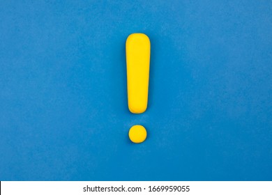 Vivid exclamation mark on blue background. Warning, keep attention concept.