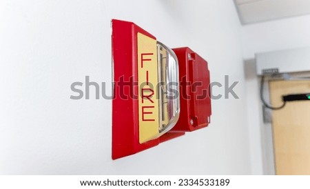 Vivid fire alarm, a symbol of caution and protection. Red-hot urgency to prevent disaster. Alertness, safety, and preparedness concept