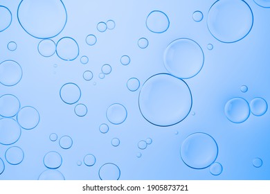 Vivid neon background with bubbles. Colorful abstract backdrop with bright gradients on blobs. Blue overflowing color.