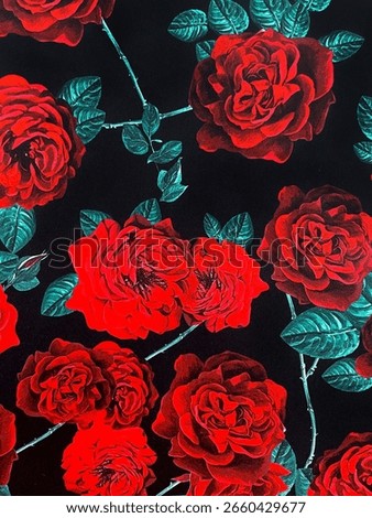 a vivid pattern of deep red roses with teal green leaves on a black background. The strong contrast and rich colors give the image a dramatic and romantic feel, like a bold painting.