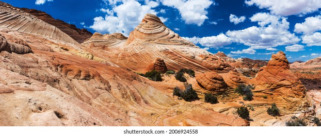 Vivid sandstone formation in Coyote Buttes North. These formations could be seen in Paria Canyon-Vermilion Cliffs Wilderness between the towns of Kanab, Utah and Page, Arizona. USA. Panorama