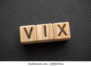 VIX - Acronym From Wooden Blocks With Letters, Volatility Index VIX Concept,  Top View On Grey Background