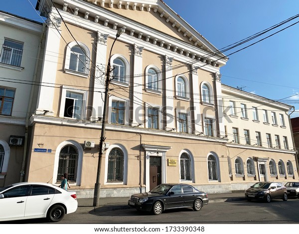 Vladikavkaz, Russia, June, 28, 2019. Cars parked\
near Department for state regulation of production and turnover of\
ethyl, alcohol and alcohol-containing products. Vladikavkaz,  North\
Ossetia
