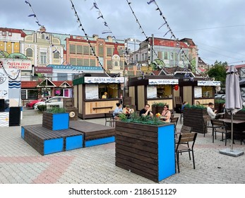 Vladivostok, Russia, July, 30, 2022.People Have Lunch At Food Street Primorye On Korabelnaya Embankment Street. Russia, Vladivostok City