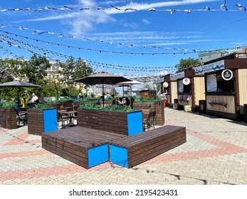 Vladivostok, Russia, July, 30, 2022.People Have Lunch At Food Street Primorye On Korabelnaya Embankment Street. Russia, Vladivostok City