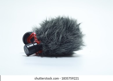 Vlog Microphone Professional Or Shotgun Mic For Shooting Production Work With Copy Space On Blue Background Color Mood And Tone Style