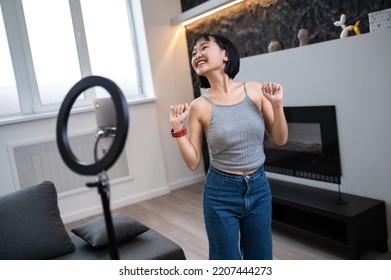 Vlogger Recording A Dance Tutorial Video For Her Digital Audience