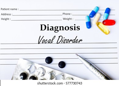 Vocal Disorder - Diagnosis Written On A Piece Of White Paper With Medication And Pills