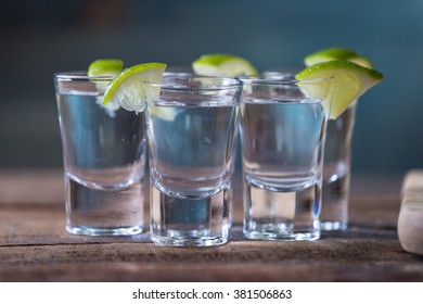 Vodka Drinks With Lemon And Lime Garnish