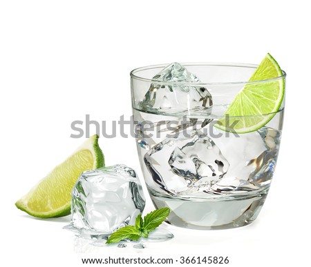 Vodka or gin  with lemon in rocks glass on white background