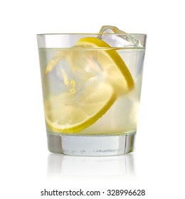 Vodka Lime, Gimlet Or Gin Tonic With Ice In Glass On White Background 