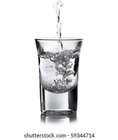 Vodka Pouring In A Glass