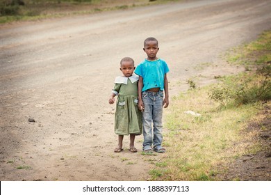 VOI, KENYA - January 2021: Kenyan Kids On The Road: Boy And Girl's Picture In Voi, Kenya