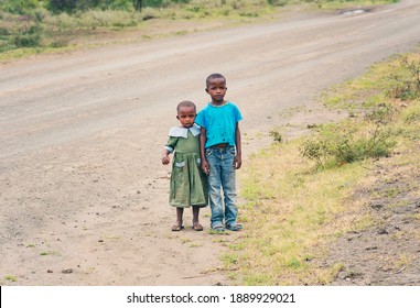 VOI, KENYA - January 2021: Kenyan Kids On The Road: Boy And Girl's Picture In Voi, Kenya