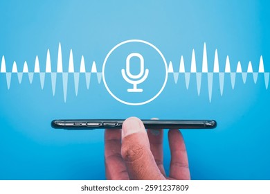 Voice recognition and AI assistant concept with smartphone, sound wave, and microphone icon on blue background,idea for artificial intelligence,speech-to-text, voice search,and digital communication.
