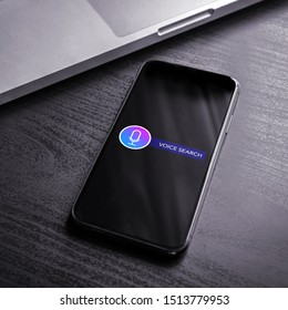 Voice Recognition, Speech Detect Application And Search Technology Concept. Close-up Smartphone Siri Application With Microphone Icon And Voice Search Text.