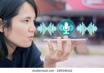 Voice Recognition,search Technology Concept.Close-up Of Woman Talking On Her Mobile Phone 