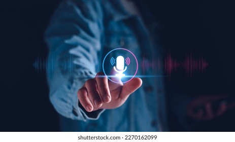 Voice recording. Man touching microphone icon on smart phone. Mobile application Record sound, audio, music, voice message. or Use your voice to direct AI to search for information on Internet. - Shutterstock ID 2270162099