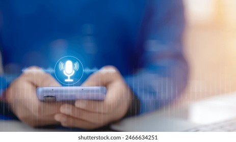 Voice recording. Man touching microphone icon on smartphone. Mobile application Record sound, audio, music, voice message. or Use your voice to direct AI to search for information on the Internet - Powered by Shutterstock