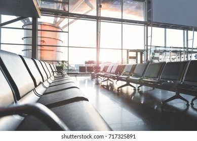 Void cozy benches situating in airport - Shutterstock ID 717325891