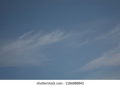 In the void flew these beautiful clouds because there is no sunlight and wind flows soar in the sky like homeless travelers it happened because in the evening the sun hides behind the horizon