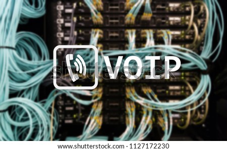VOIP, Voice over Internet Protocol, technology that allows for speech communication via the Internet. Server room background.