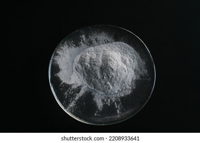 Volcanic Ash In Watch Glass With Black Background