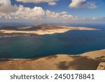 Volcanic beaches in the Canary Islands. Lanzarote 2018. Beautiful volcanic landscape, ocean and rocks. Tourism, sightseeing in the Canary Islands. Summer all year round.