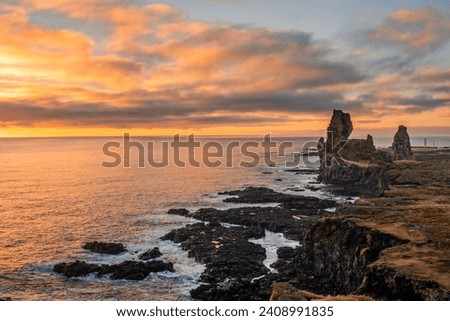 Volcanic cliffs of Londrangar over the Atlantic Ocean, Snaefellsnes peninsula, Iceland