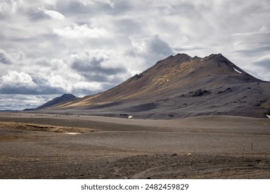 Volcanic landscape of North Iceland with barren mountains and lava fields. - Powered by Shutterstock