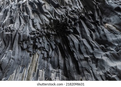 Volcanic rock formation at Gole Alcantara Botanical and Geological Park. Alcantara River gorge at Sicily.